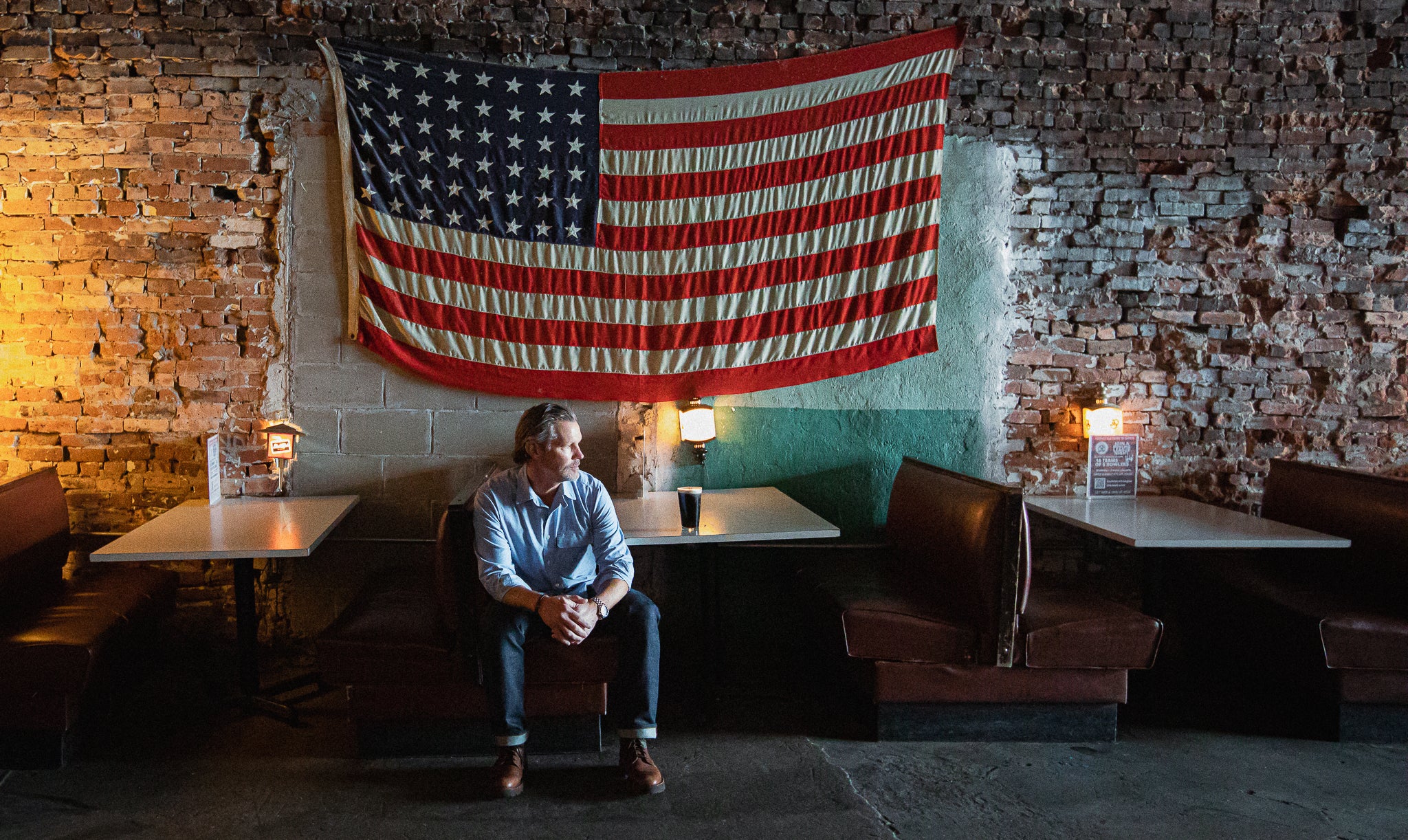 About our founder John Gallagher wearing Chieftain Straight Denim and Hudson Work Shirt in Light Blue